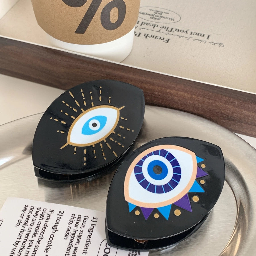 exaggerated funny devil's eye acetic acid sheets hair claws