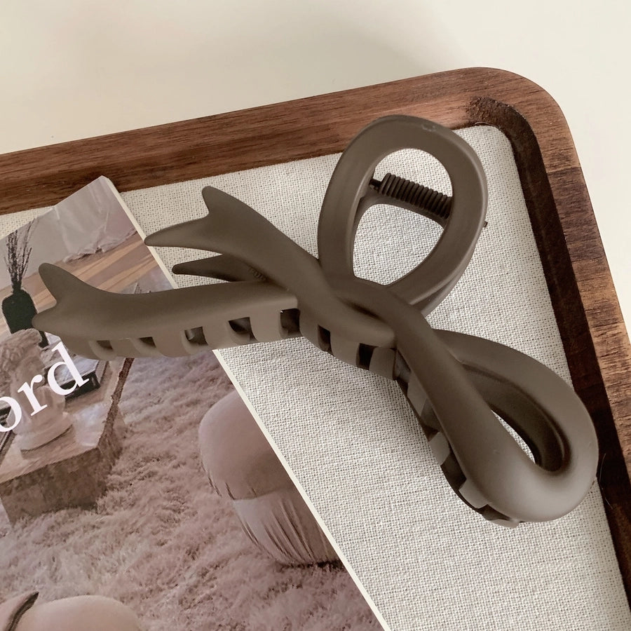 simple style bow knot plastic hair claws