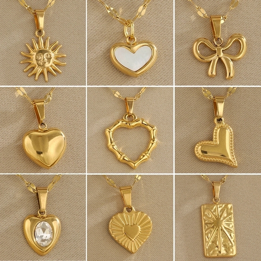 Jewelry Simple Style Classic Style Sun Heart Shape Bow Knot 201 Stainless Steel 304 Stainless Steel Rhinestones Shell Zircon 18K Gold Plated Inlay Pendant Necklace