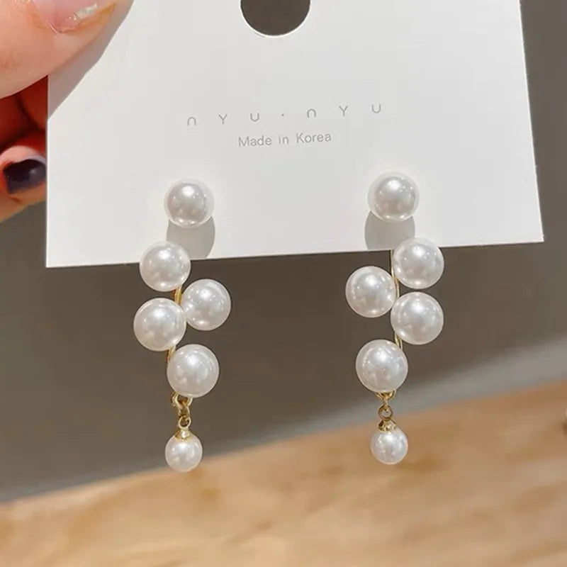 1 pair elegant simple style streetwear flower bow knot plating inlay alloy artificial pearls zircon ear studs