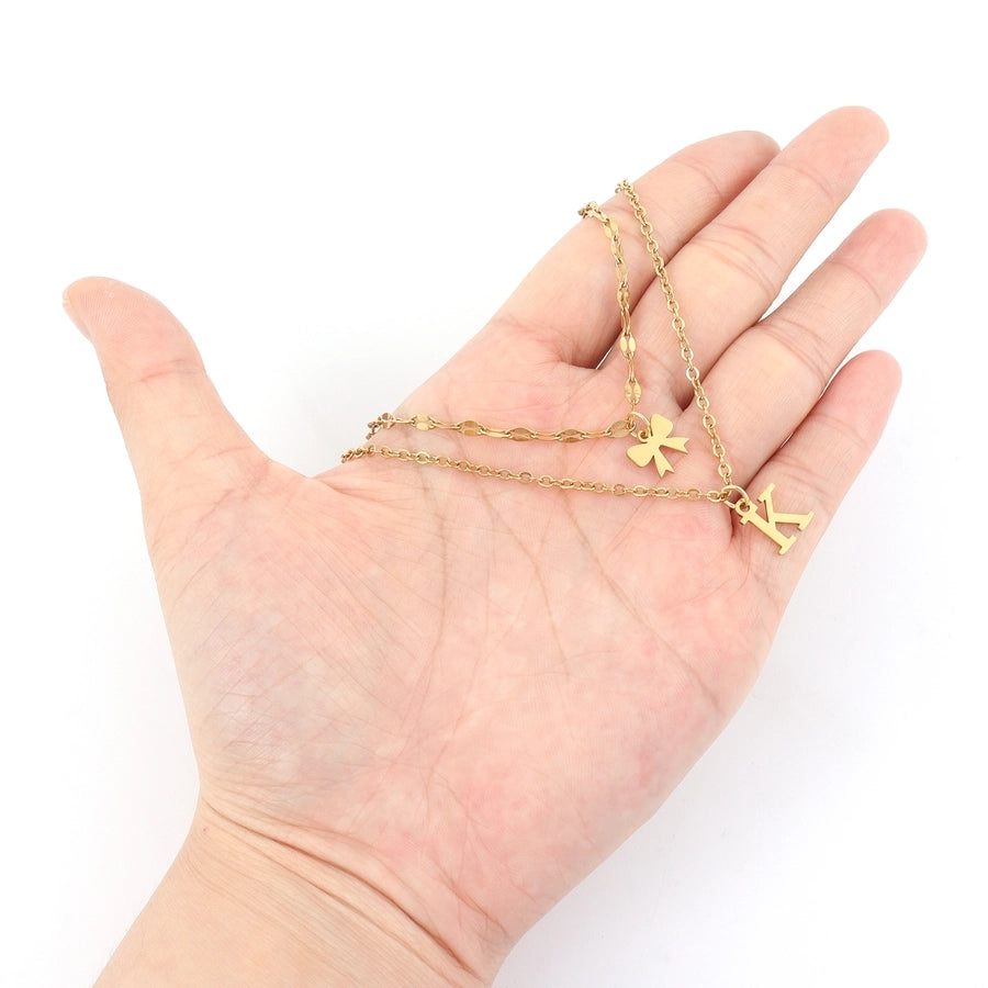 Jewelry Elegant Simple Style Classic Style Letter Bow Knot 201 Stainless Steel 304 Stainless Steel Pendant Necklace